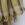 Détail étole cachemire pashmina avec franges couleur moutarde avec rayures