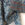 Blouse bohème à motifs stylisés blancs sur fond indigo